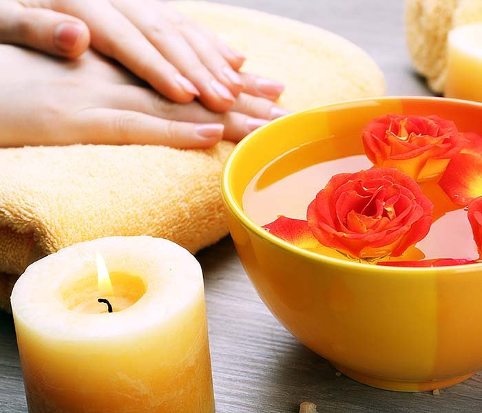 Spa bowl with flowers and candle